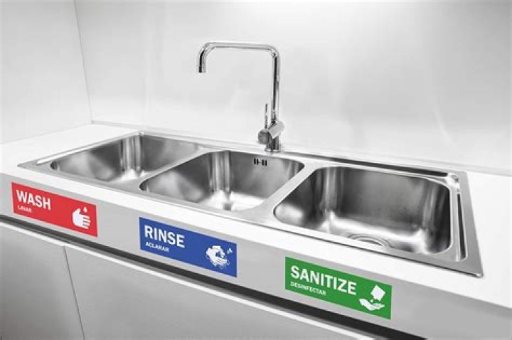 How do I sanitize my kitchen sink