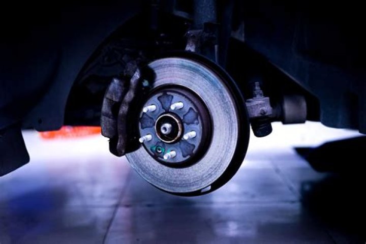 What causes pitted brake discs